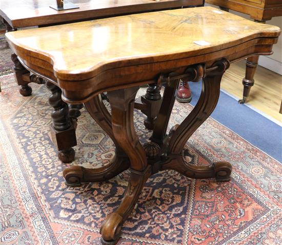 A Victorian walnut card table, W.3ft